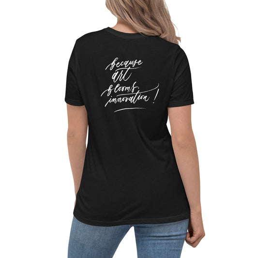 Handwritten "Teach Because Art Blooms Innovation" Calligraphy White Chalk Script Printed on Back of Women's Relaxed Black T-Shirt - Teach Because #05