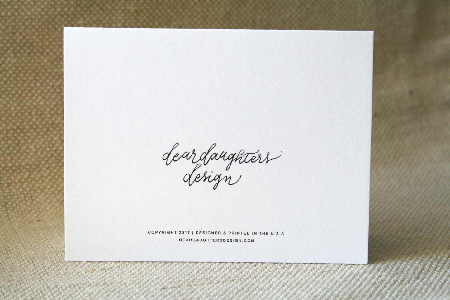 Dear Daughters Design greeting card back.