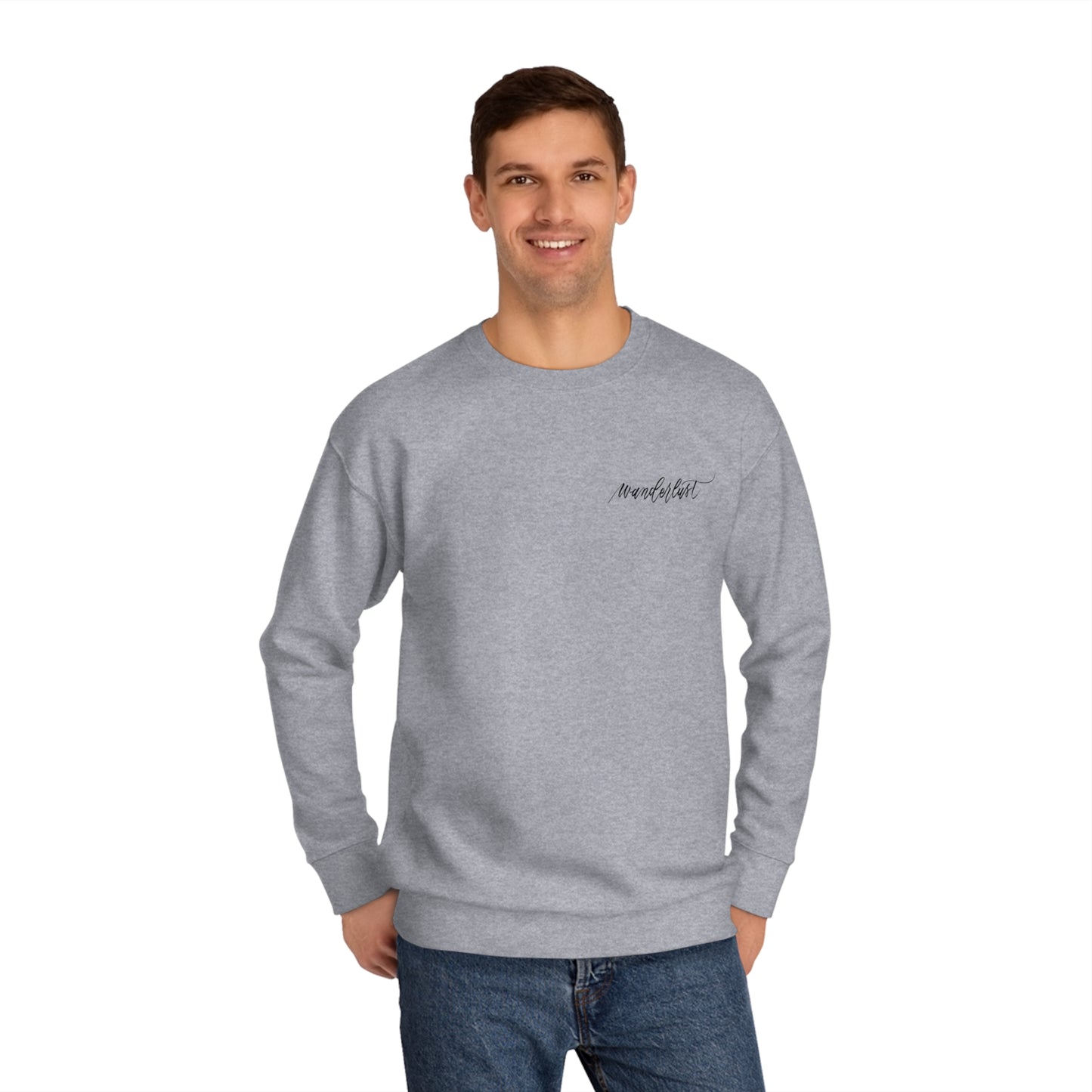 Man wearing Heather Grey neck sweatshirt with modern calligraphy word "wanderlust" on left chest.