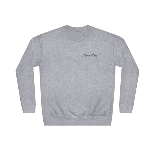 Flat lay Heather Grey crew neck sweatshirt with modern calligraphy word "wanderlust" on left chest.