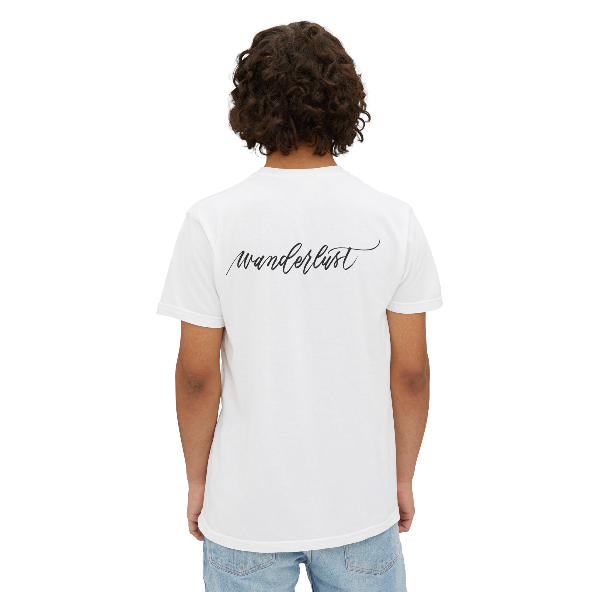 Back of person wearing a travel wanderlust t-shirt in white.