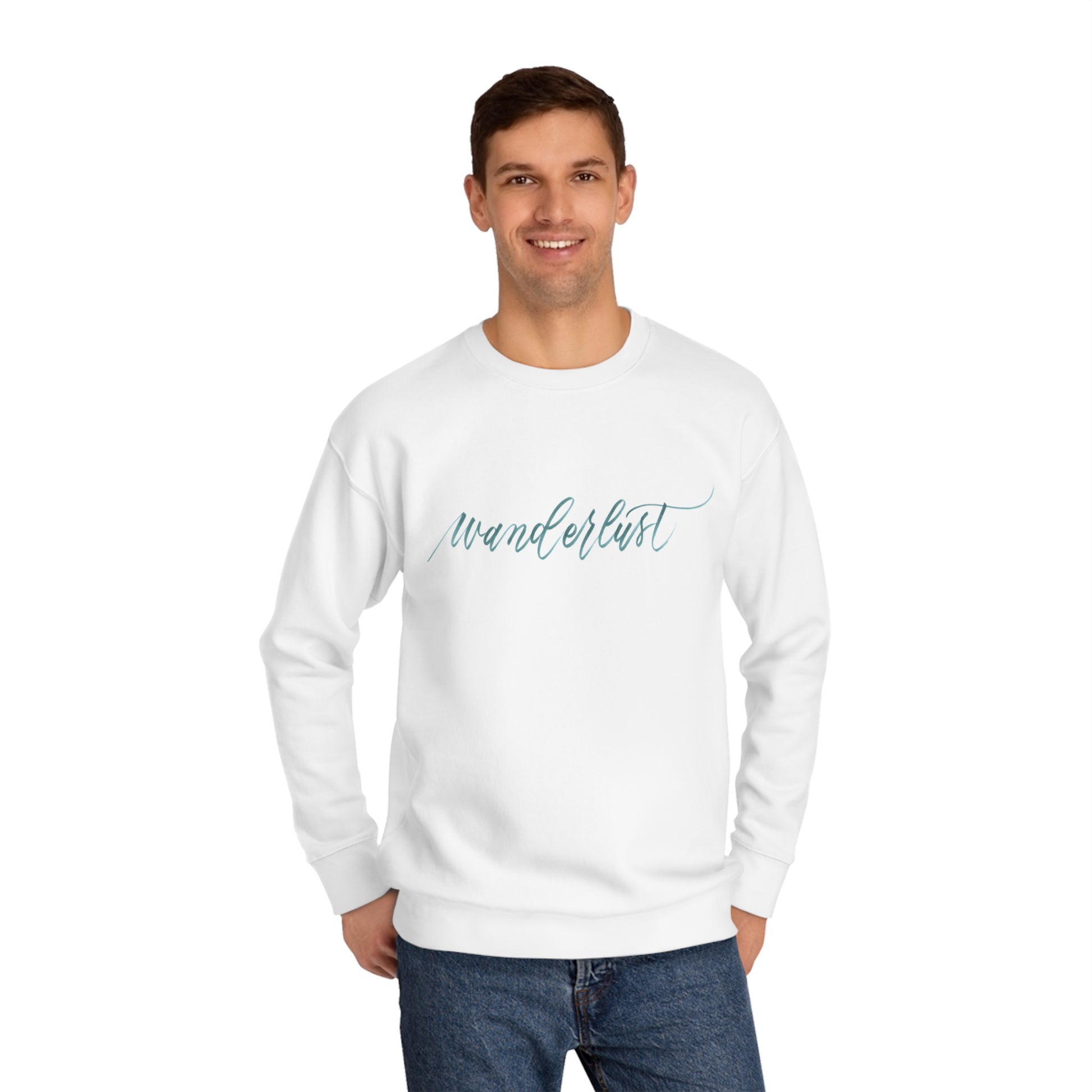 Man wearing white crewneck sweatshirt with a calligraphy design on front that reads "wanderlust".