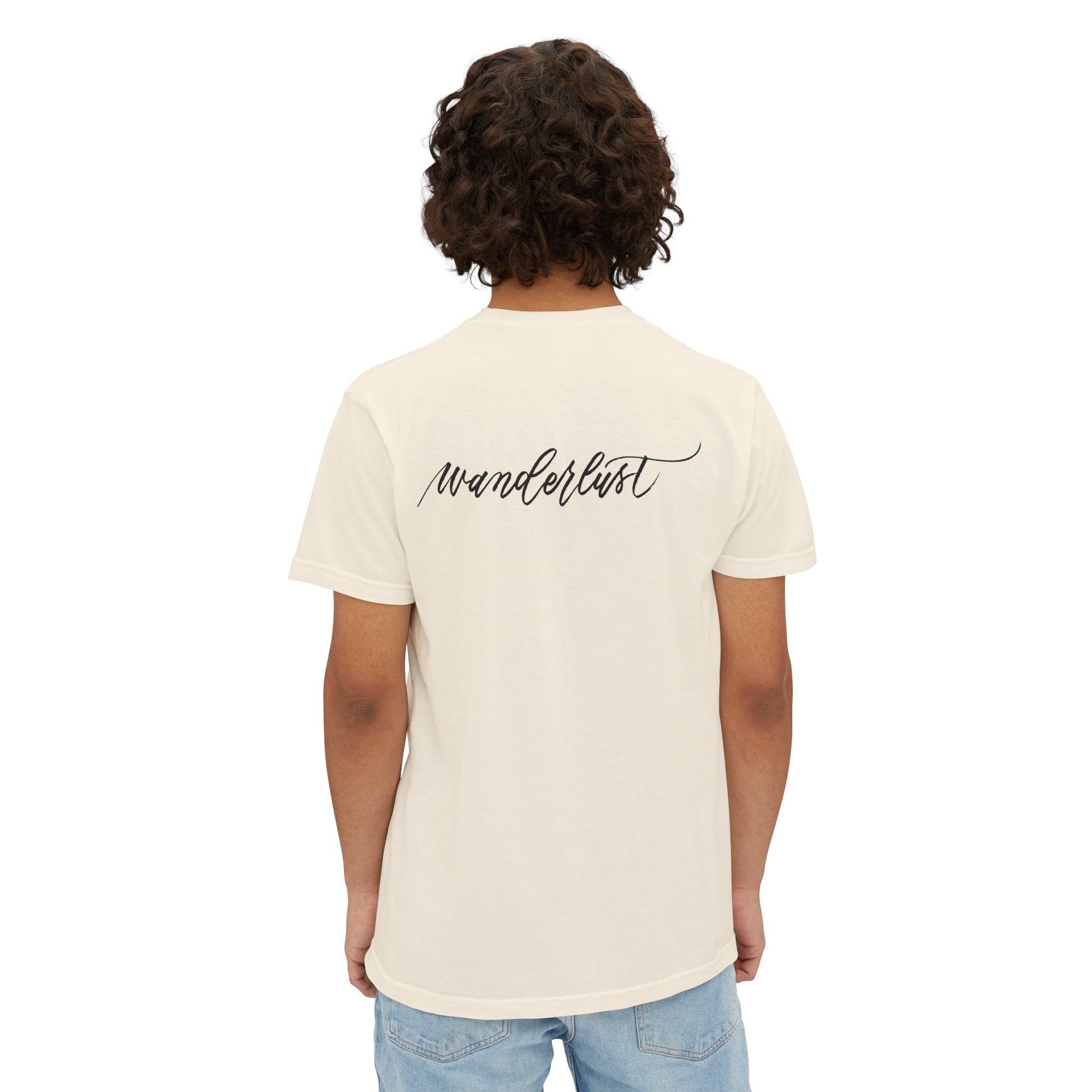 Back of person wearing a travel wanderlust t-shirt in ivory.