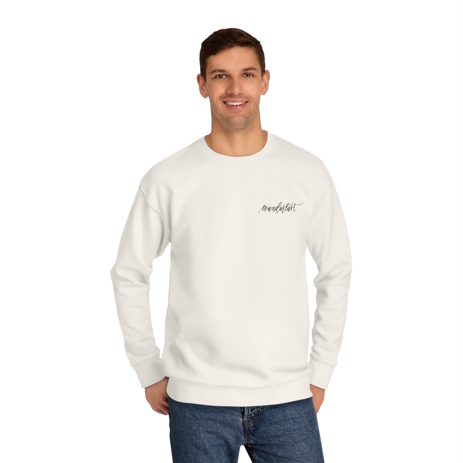 Man wearing ivory crew neck sweatshirt with modern calligraphy word "wanderlust" on left chest.