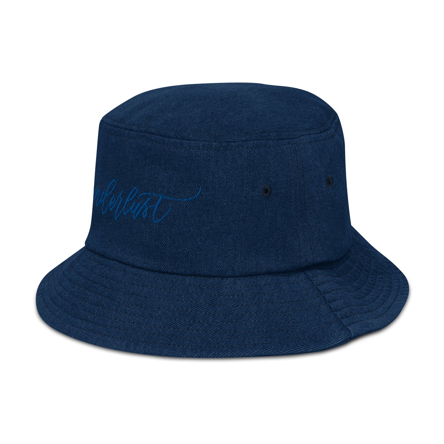 Denim blue bucket hat with other side view of modern calligraphy "wanderlust" word embroidered on with blue thread.