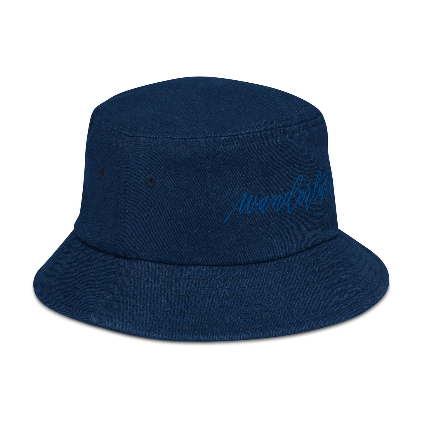 Denim blue bucket hat side view with modern calligraphy "wanderlust" word embroidered on with blue thread.