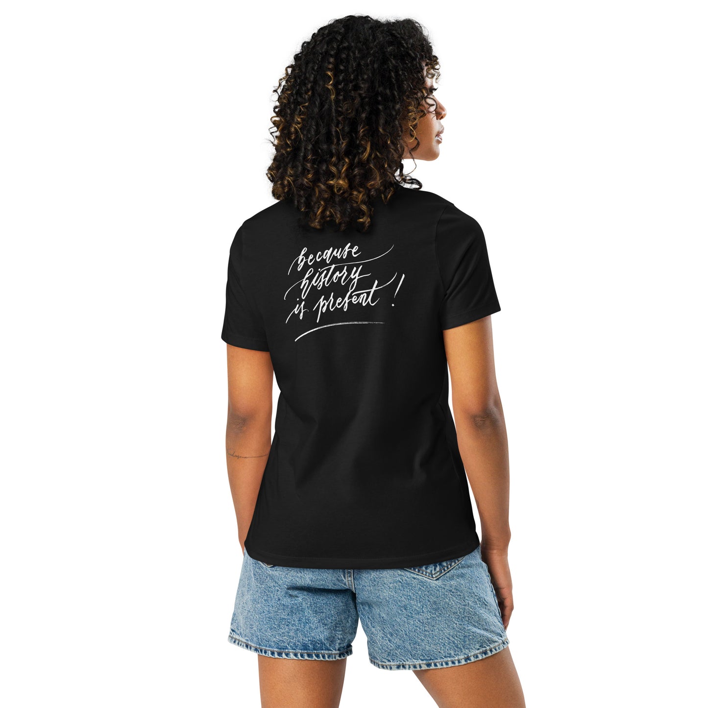 Handwritten "Teach Because History is Present" Calligraphy White Chalk Script Printed on Back of Women's Relaxed Black T-Shirt - Teach Because #04